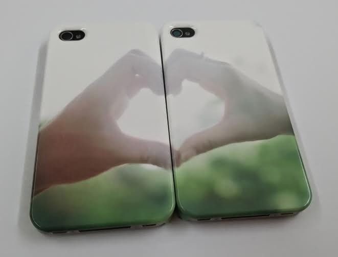 a pair of matching phone cases
