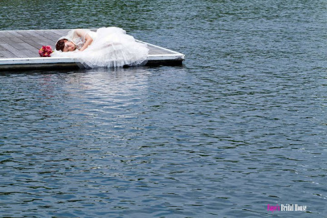 bride sleeping on a jetty