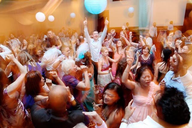 a wedding party filled in booze and dance