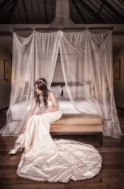 post editing done on bride sitting on bed