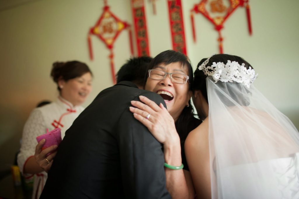 hugging parent during tea ceremony